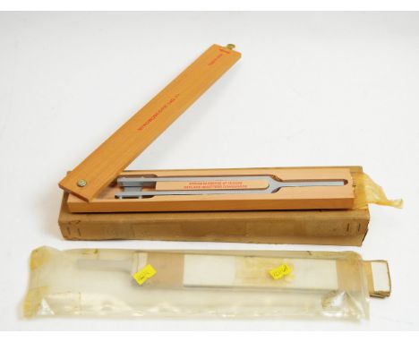 A Stroboscope 140 tuning fork, in beechwood case; and another in card case; two vintage brass thermometers, supplied and pack