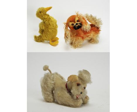 Steiff, Germany: a white mohair poodle 'Snobby', c.1960, with glass eyes and nose, velvet ears and articulating limbs, with m