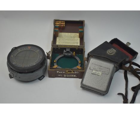 An RAF issue compass, Type P10, stamped '6B/1671' under broad-arrow-mark, No.5855T; an 1880 pattern Azimuth Circle, cased; an