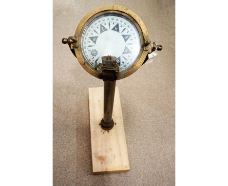 A brass ship's compass, by Decca, Copenhagen, stamped Serial No. 539/0 PATT 2961 and A/R/60, on brass column support and late
