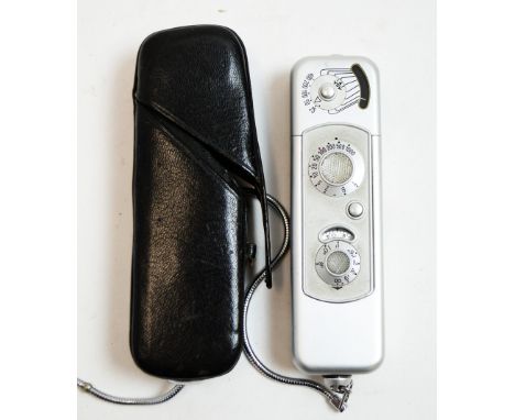 A Minox Wetzlar miniature camera, with Complan 1:3.5 f=15mm lens, leather case.