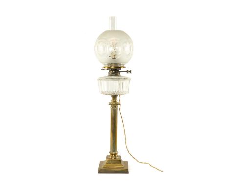 VICTORIAN BRASS CORINTHIAN COLUMN OIL LAMP, with glass reservoir and shade, converted to electricity.Provenance: private coll