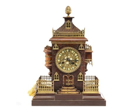19TH C. CONTINENTAL MANTEL CLOCK , 4.5" gilt masked dial, architectural case in the form of a 'French Chateau', with cannons 