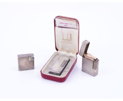 A DUNHILL SILVER PLATED RECTANGULAR GAS LIGHTER (3)With case and directions, another Dunhill silver plated square petrol ligh