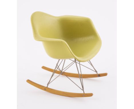 A SCALE MODEL OF A VITRA ROCKING CHAIR BY CHARLES AND RAY EAMES11cm wide; 12cm high