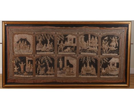 A BURMESE KALAGA TAPESTRY20th Century
Depicting ten individual scenes, adorned with sequins and glass beads, frame 275cm x 14
