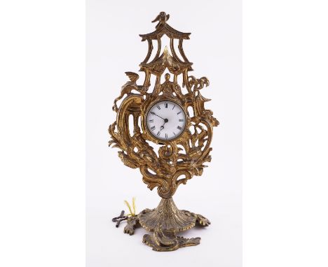 A VICTORIAN ROCOCO REVIVAL GILT-METAL TIMEPIECEColeridge Collection, Mid-19th CenturyModelled in the Chinoiserie taste, with 