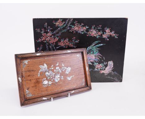 A LACQUER AND ABALONE INLAID BOX AND A HARDWOOD TRAY (2)19th century
Box decorated with plants and roosters, 40cm wide; the t