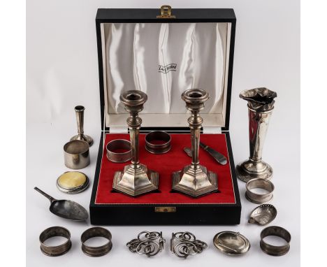A PAIR OF SILVER CANDLESTICKS AND A GROUP OF SILVER (QTY)Comprising; the candlesticks raised on hexagonal bases, Birmingham 1
