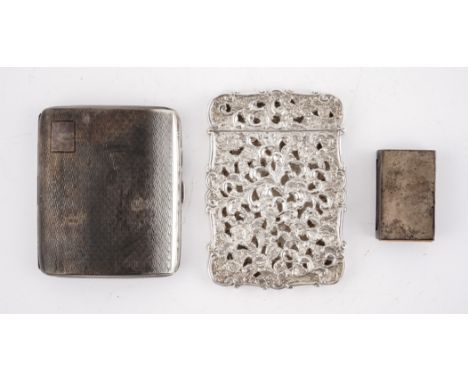 A VICTORIAN SILVER VISITNG CARD CASE AND TWO FURTHER ITEMS (3)The shaped rectangular card case, with pierced decoration, in a