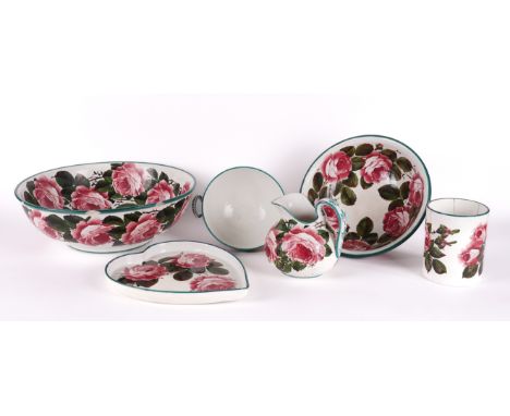 A GROUP OF WEMYSS WARE (6)Circa 1900Each piece painted with pink cabbage roses, comprising; a small jug, 16.5cm high; two bas