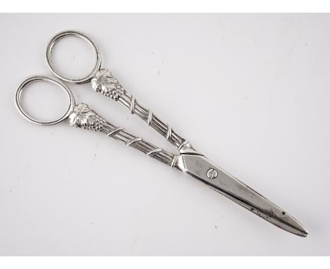 A PAIR OF REGENCY SILVER GRAPE-SCISSORSColeridge Collection, Having loop shaped handles, decorated with fruiting vine, makers