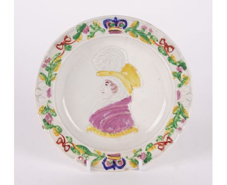 A SMALL SCOTTISH PEARLWARE COMMEMORATIVE  PLATECirca 1822Probably Prestonpans, moulded with a titled bust portrait of Queen C