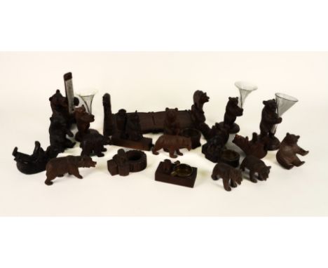 A COLLECTION OF BLACK FOREST CARVED LINDEN WOOD BEARS AND ANOTHER (20)Early 20th Century 
Including a book slide, three spill