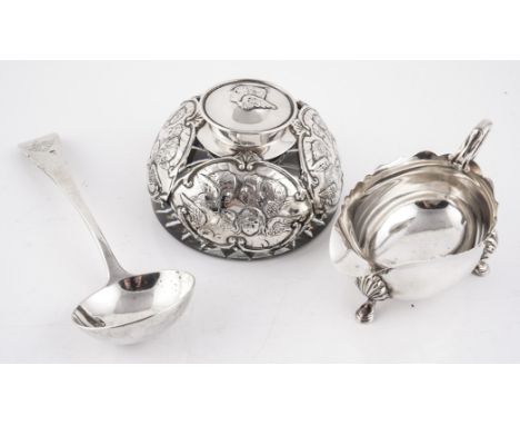 A SILVER MOUNTED INKSTAND AND TWO FURTHER ITEMS. (3)The circular glass inkstand with a facet cut base, the silver mount decor