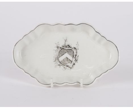 A WORCESTER FLUTED SPOON TRAYColeridge Collection, Circa 1772-75Printed in greyish-black with the Arms of Cocks within a roco