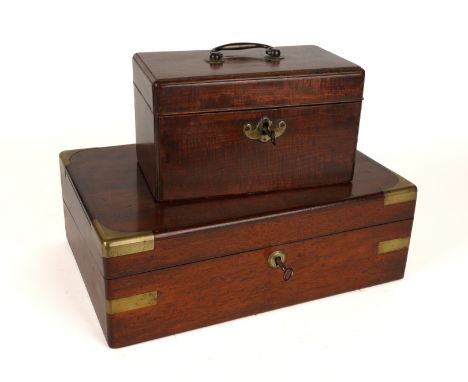 A GEORGE III MAHOGANY TEA-CADDY TOGETHER WITH A BRASS MOUNTED MAHOGANY WRITING SLOPE (2)The tea-caddy with three pewter canis