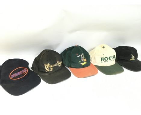 A Collection of vintage 90s hats including Cypress Hill, R.EM, Beavis and Butthead