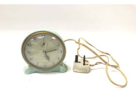 A SMITHS electric aqua plastic electric table alarm clock.