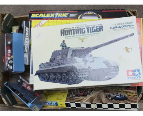 A Collection of various toys including a boxed Tamiya Hunting Tiger German Tank model set, boxed PPM super stacker compact, S