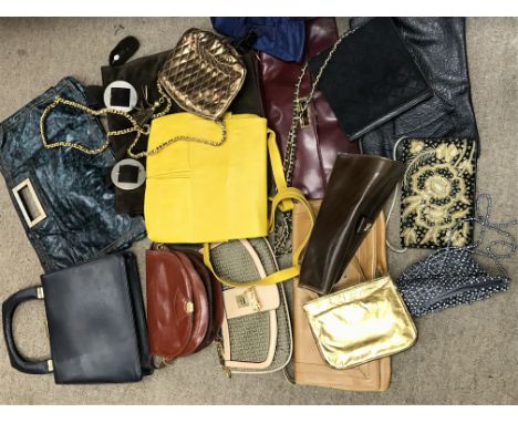A collection of various vintage ladies handbags