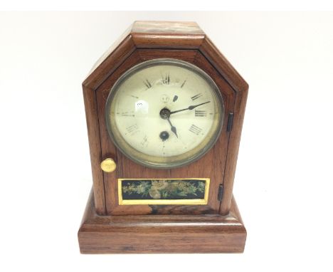 A small mantle clock. No reserve.