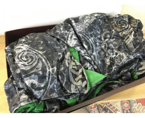 A boxed Harry potter invisibility cloak