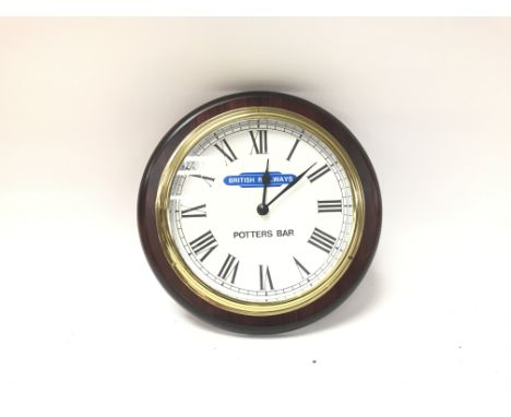 A modern British railways potters bar wall clock.