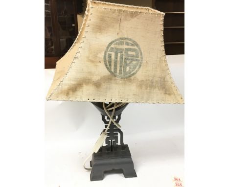 An oriental lamp, made in Hong Kong. Approximately 60cm tall,