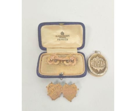 Two gold fronted Mizpah brooches and a similar locket. (3).Condition report:Gold fronted refers to the thin sheet of gold app