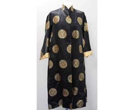 Vintage Chinese reversible black and gold silk coat, with brocade medallions. 