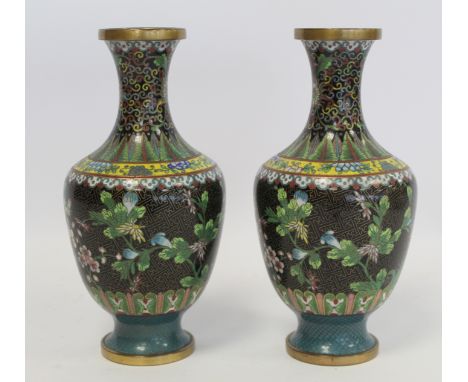 Pair of late 19th/early 20th century Chinese black cloisonné vases of baluster form with polychrome floral decoration on a la