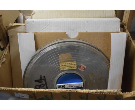 Box containing a quantity of vintage computer tape reels