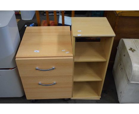 Light wood finish two drawer chest and a similar revolving bookcase (2)