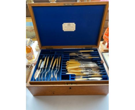 Antique light oak cutlery chest containing drawers and loose cutlery