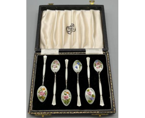 A Boxed set of 6 Birmingham silver and enamel flower design tea spoons. Produced by Henry Clifford Davis. [Two have slight da