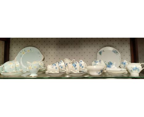 A Shelf of three various tea sets includes Trentham flower pattern tea service 