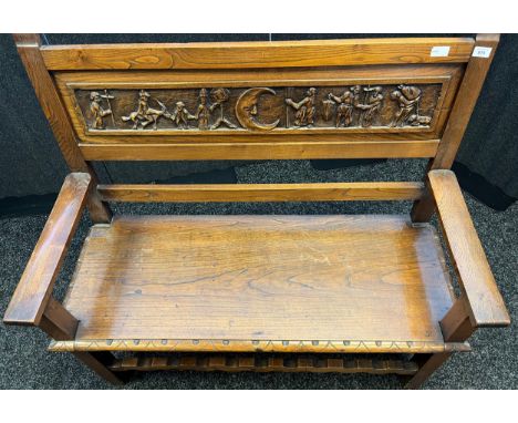 Early 20th century oak Scandinavian hall bench. Back panel depicting carved figures from Scandinavian folk tales. [104x110x45