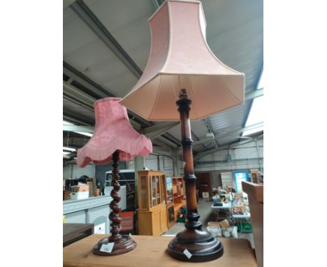 Contemporary tall table lamp together with an antique barley twist table lamp. 