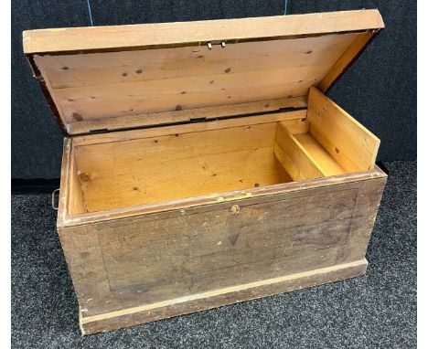 Antique pine travel trunk, Fitted wrought iron side handles, Interior has a small storage and drawer compartment. [52x101x54c