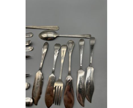 A Collection of mixed Sheffield silver flatwares. includes Tongs, Knives and spoons. [Total weight- 312grams] 