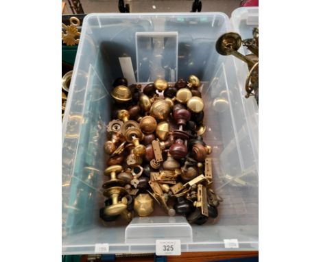 A Box containing a large quantity of antique wood and brass door handles and sash window brass locks. 