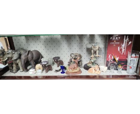 Shelf of animal figures and boxed port decanter set in box. 