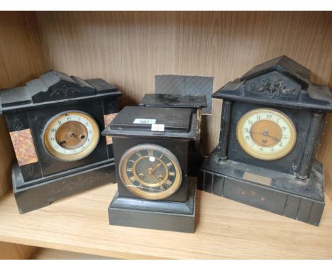 A Shelf of four slate mantel clocks, Three with workings. 
