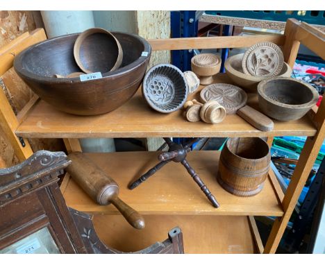 A Collection of wooden treen items to include various antique wooden moulds and rollers. Large turned fruit bowl, oak barrel,
