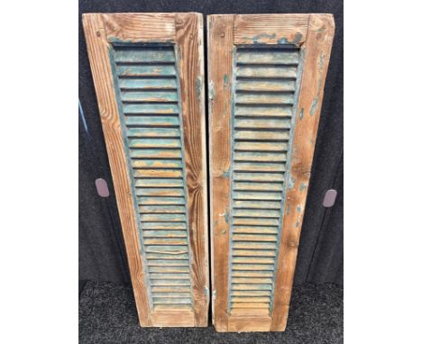 Two antique French pine painted window shutters. [113x29cm- each panel] 