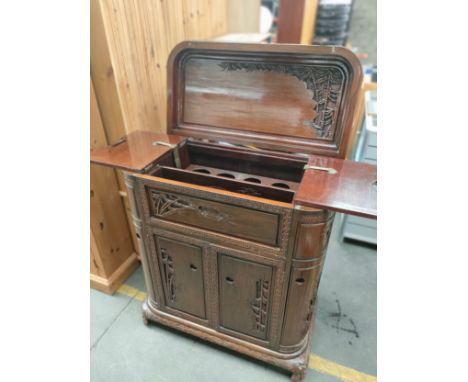 A Oriental carved buffet cabinet 