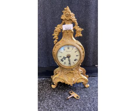 Imperial Italian brass ornate mantel clock with a movement made by Franz Hermle &amp; Sons of Germany with key. 