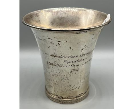 A Danish silver beakerAssay Master Johannes Siggaard 1932-1960, maker K C Hermann, broad flared rim to the tapering body, eng