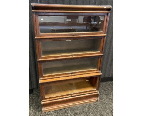 Antique Oak four section barristers bookcase. Produced by 'The Globe- Wernicke Co Ltd- London' [140x87x32cm] [Base door missi